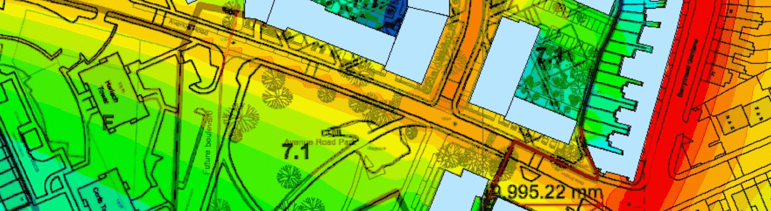 A road-traffic noise map: coloured bands of calculated noise level across streets, buildings and a park.